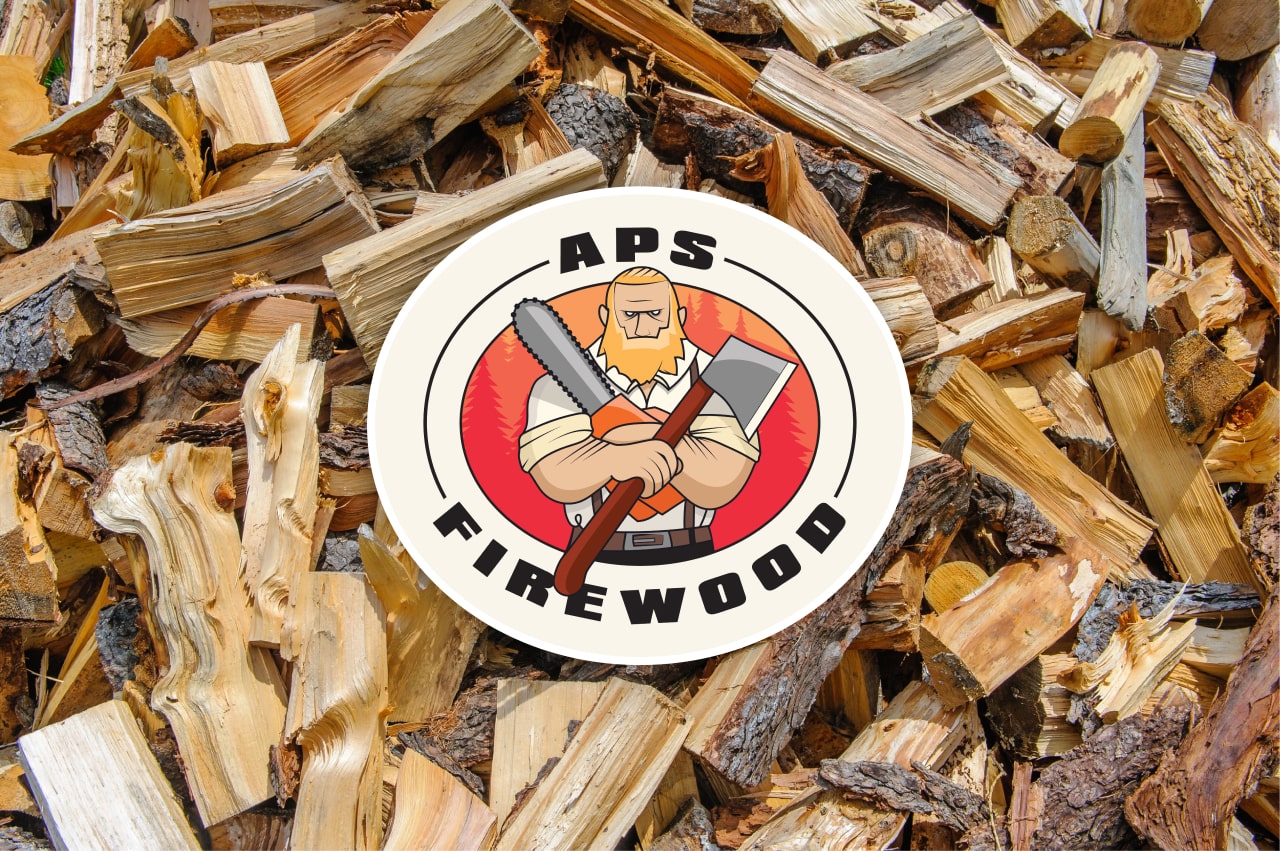 APS Firewood lumberjack logo atop chopped wood